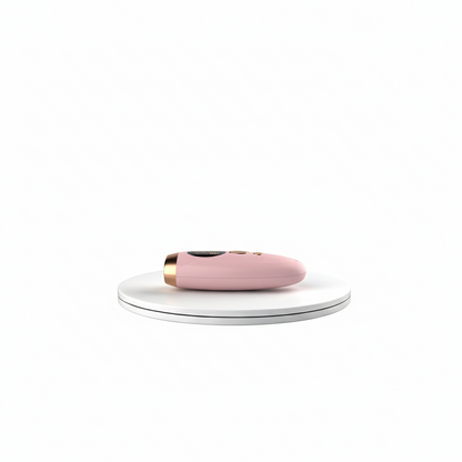 Appareil laser IPL rose sur une base tournante, offrant une vue claire du produit pour l'épilation à domicile avec un design élégant et moderne.