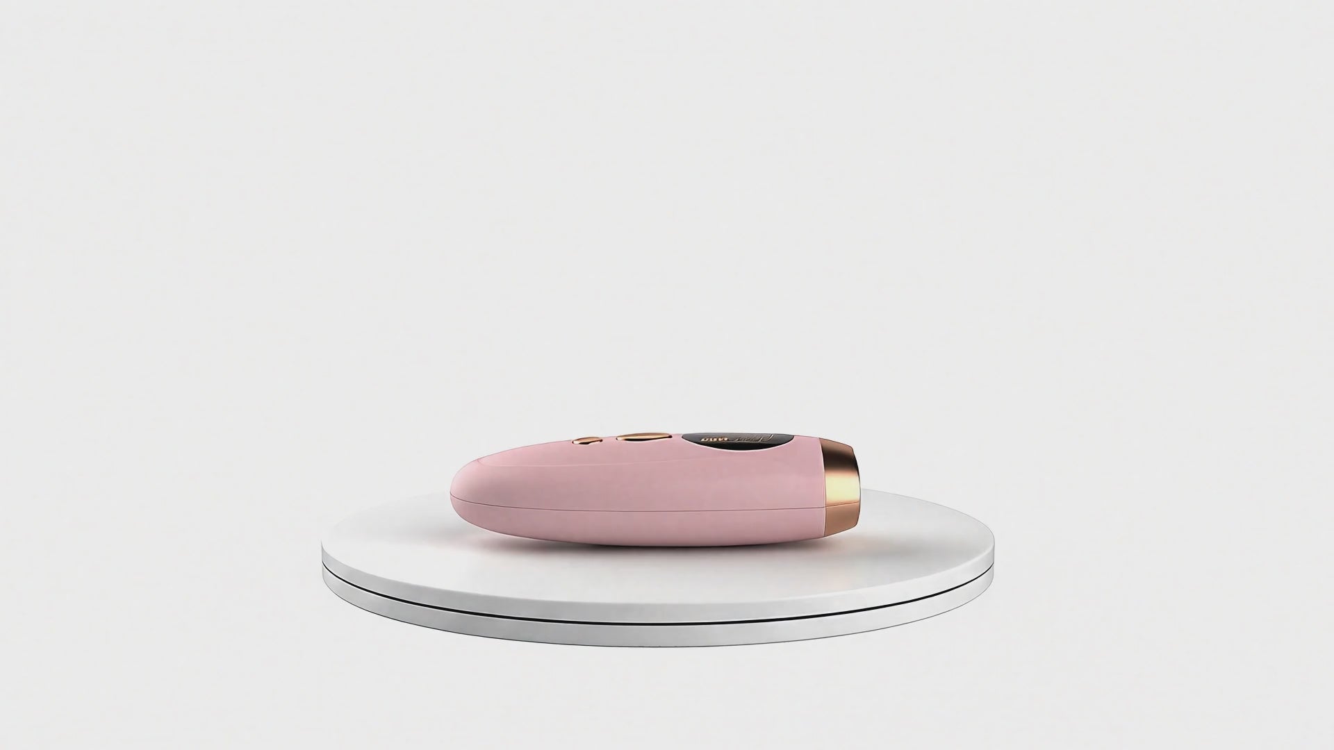 Vidéo montrant un appareil laser IPL rose tournant sur un plateau, offrant une vue à 360° du produit pour l'épilation à domicile.